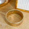 Large bracelet acier doré
